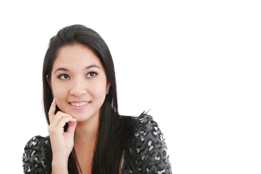 a young, pretty woman looks thoughtfully up - space for text