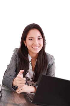 business woman sitting on chair at desk in office and pointing to you:yes,you!
