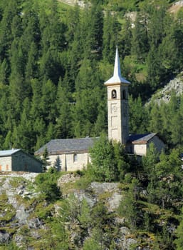 Saint-Jacques d&#039 Assyrie church at Tignes in the Alps mountains, France. This chruch is the exact replica of the Tignes&#039 church of the old Tignes village that was flooded and disapeared in 1952 because of the creation of a dam.