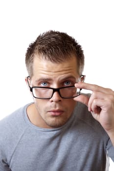 Man adjusting his glasses to get a better view