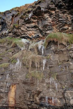 icicles on a cliff face in ballybunion ireland on a winters morning