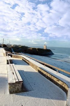 a snowy coastal road in ballybunion ireland