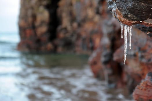 icicles on a cliff face in ballybunion ireland on a winters morning