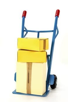 a hand truck with various packages