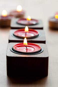 Close-up of red tea-light candles for Christmas