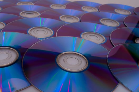Background of Many Glowing CD Compact Discs