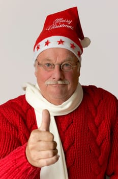 Santa Claus shows top thumbs up