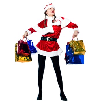one woman dressed as santa claus carrying christmas bags  on studio isolated white background