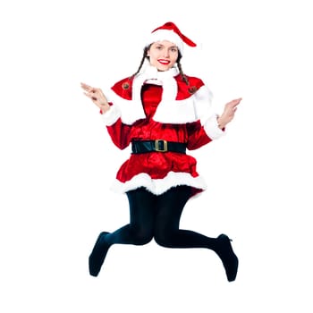 one woman dressed as santa claus jumping showing christmas product placement on studio isolated white background