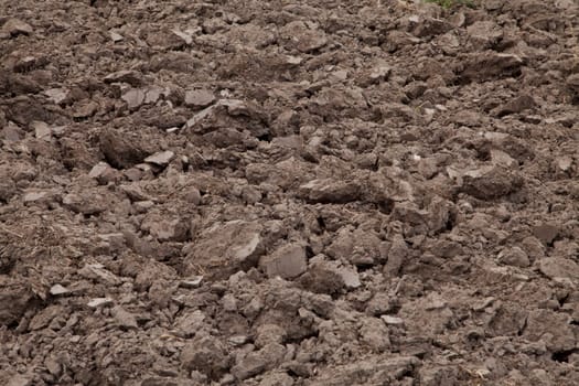 Soil in the freshly ploughed field