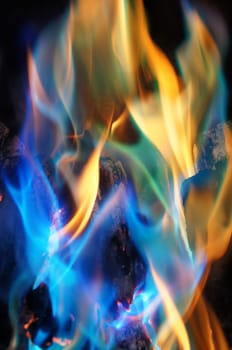 Copper Sulfate fuelled flames from a log fire