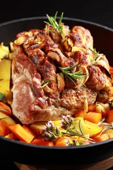 Tasty roasted pork meat with western potatoes and vegetable