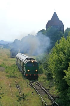 Passenger train departing from the abandoned station