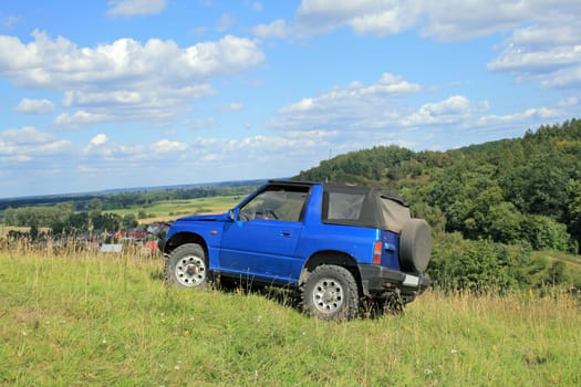 Off-road. 4x4 jeep at the top of a hill