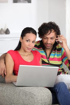 Couple enjoying modern technology