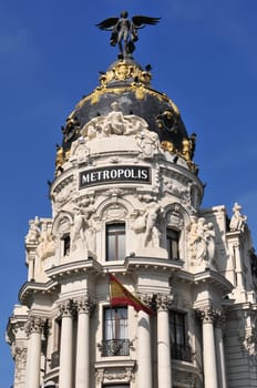 Metropolis building detail in Madrid city center (Spain).