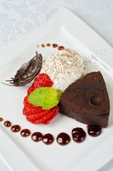 Chocolate flan with strawberries and chocolate, a wonderful dessert
