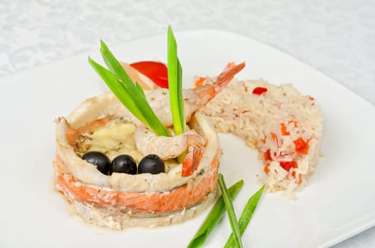 tasty prepared fish with rice and vegetables