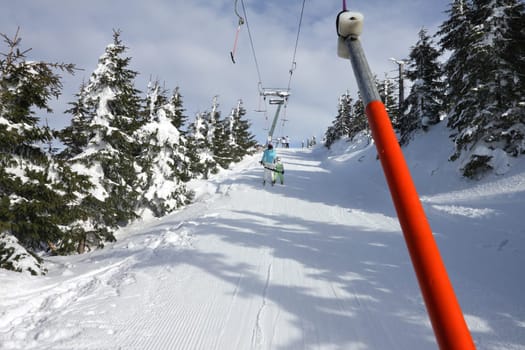 Czech mountains krkonose in winter - people on ski tow