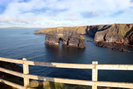 a view of the virgin rock in ballybunion ireland as seen from the cliffs on a calm winters day
