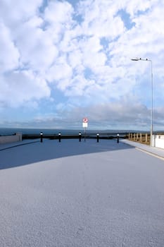 a snowy covered coastal culdesac road in ballybunion ireland