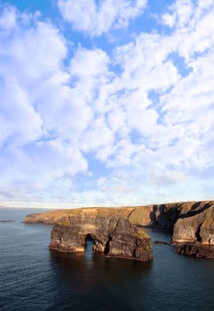 a view of the virgin rock in ballybunion ireland as seen from the cliffs on a calm winters day