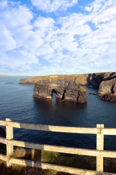 a view of the virgin rock in ballybunion ireland as seen from the cliffs on a calm winters day