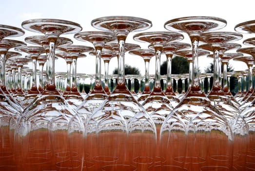 glasses upside down on a red tablecloth