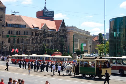 POZNAN, POLAND - JUNE 26, 2010 celebration of the 130th anniversary of MPK Poznan sp. z o.o. combined with a solemn parade of the vehicles. Both buses and tramways were put in ordered cue from the oldest to the newest starting from the horse tramway (1880