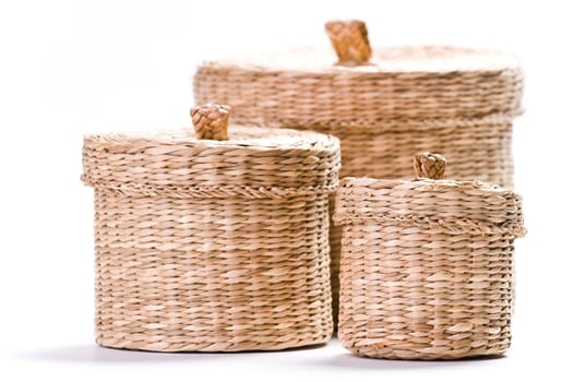 Brown baskets isolated on bright white background