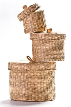 Brown baskets isolated on bright white background