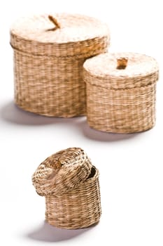Brown baskets isolated on bright white background