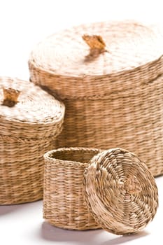 Brown baskets isolated on bright white background
