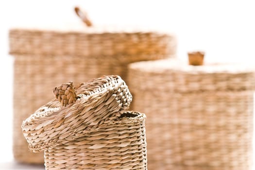 Brown baskets isolated on bright white background