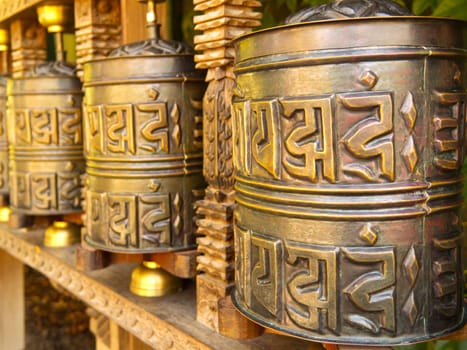 Tibetan prayer wheel,turning the roller with the right hand brings good karma