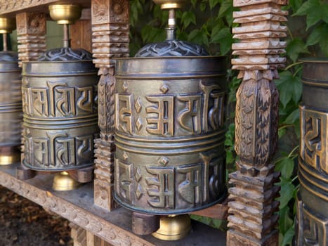 Tibetan prayer wheel,turning the roller with the right hand brings good karma