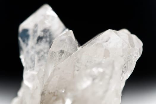White Glowing Rock Crystal Quartz with Black Background