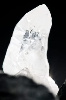 White Glowing Rock Crystal Quartz with Black Background