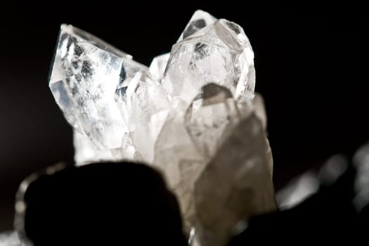 White Glowing Rock Crystal Quartz with Black Background