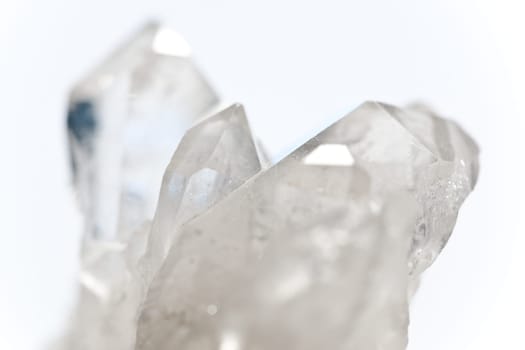 White Glowing Rock Crystal Quartz with White Background