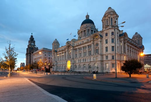 Three Graces and Liver building on waterfront in Liverpool, England