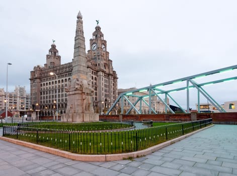 Three Graces and Liver building on waterfront in Liverpool, England
