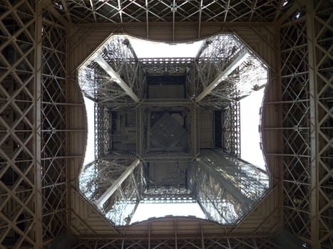 Unusual view inside the center of the Eiffel tower in Paris