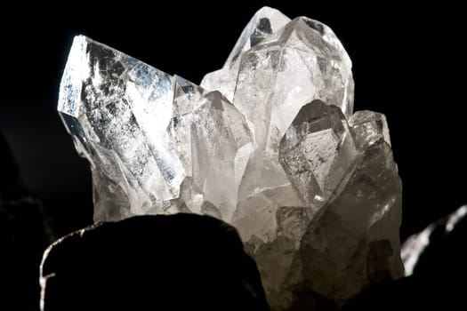 White Glowing Rock Crystal Quartz with Black Background
