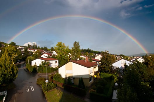 Rainbow over a small village