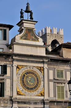 rinascimental wall clock in the central square, famous also for the terrorist attack