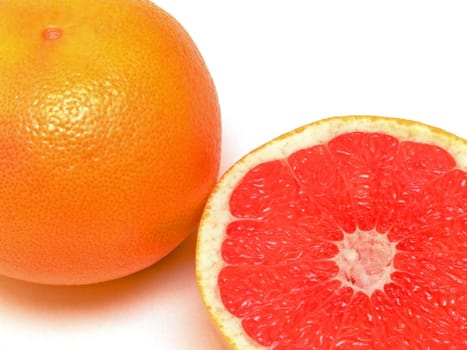a grapefruit with spoon