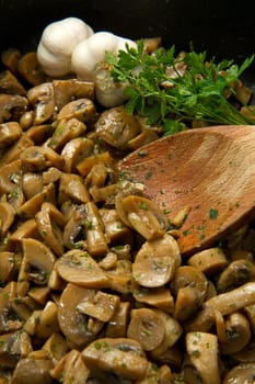 cooked mushroom with parsley and garlic