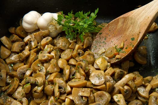 cooked mushroom with parsley and garlic