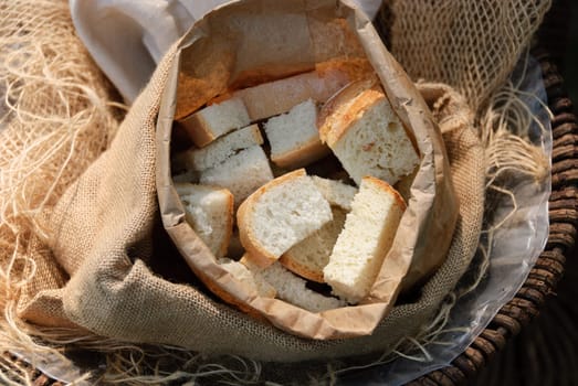 pieces of bread in a paper bag